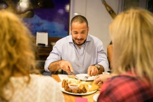 main 2 12 eating fish and funchi and panbati 1